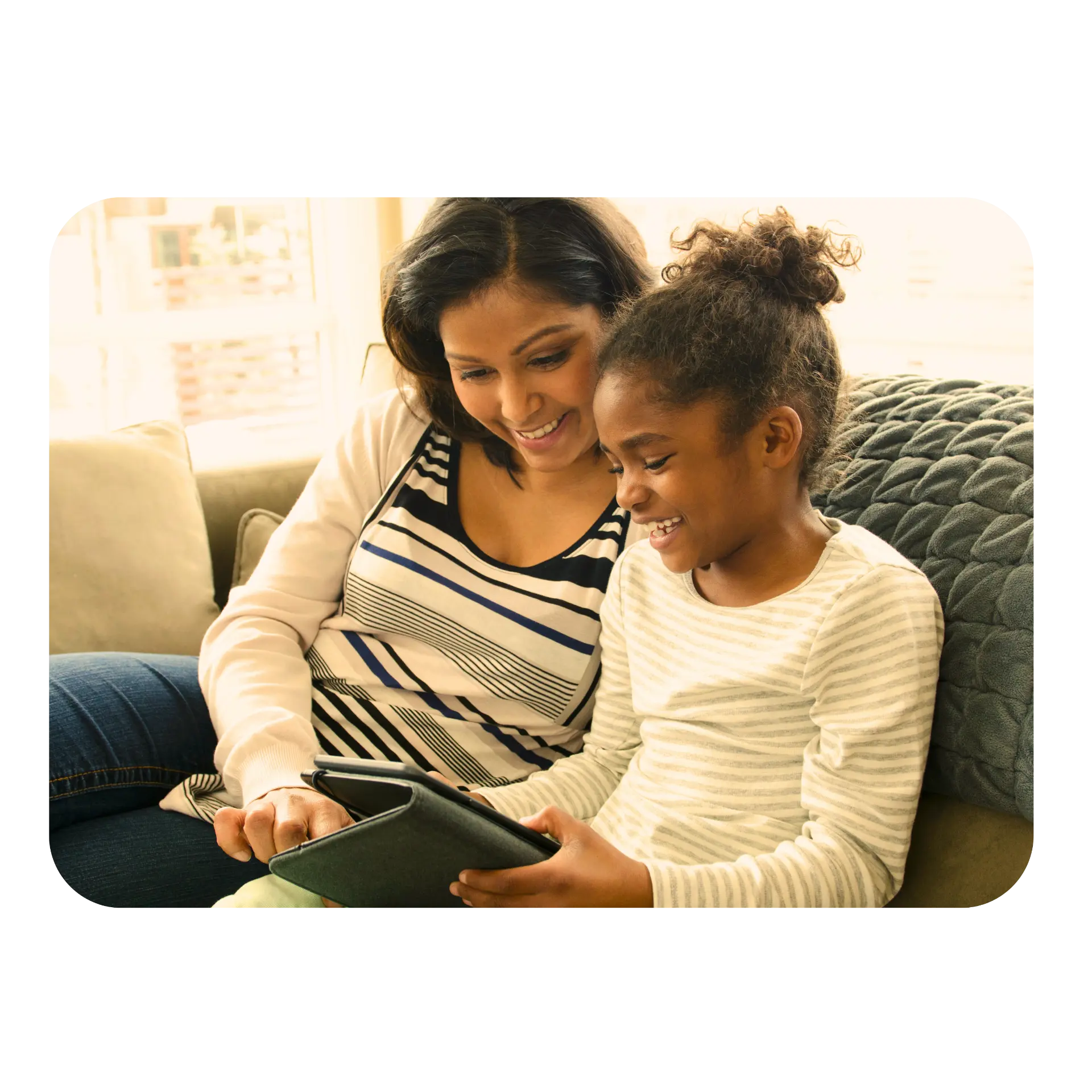 A mother and daughter laughing together